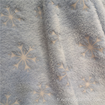 Tissu de flanelle chaud imprimé à la colle avec motif flocon de neige